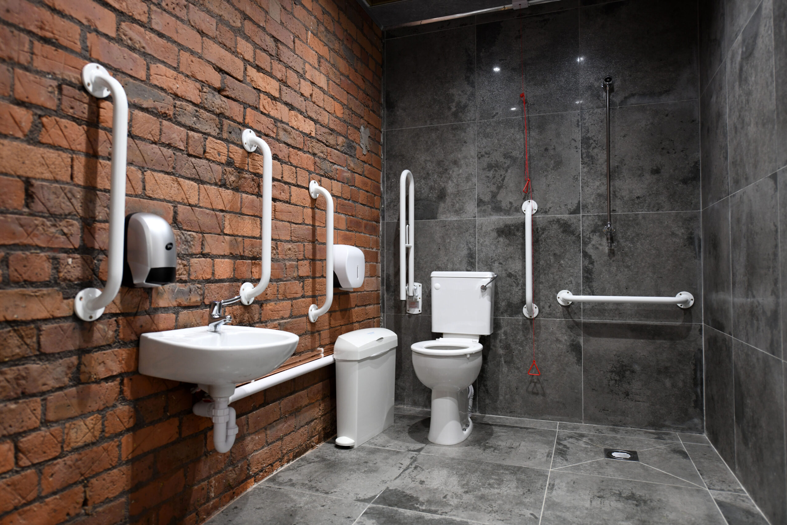 ccessible restroom at Ram Mill Business Centre with modern facilities, safety grab rails, and a spacious layout designed for comfort and convenience