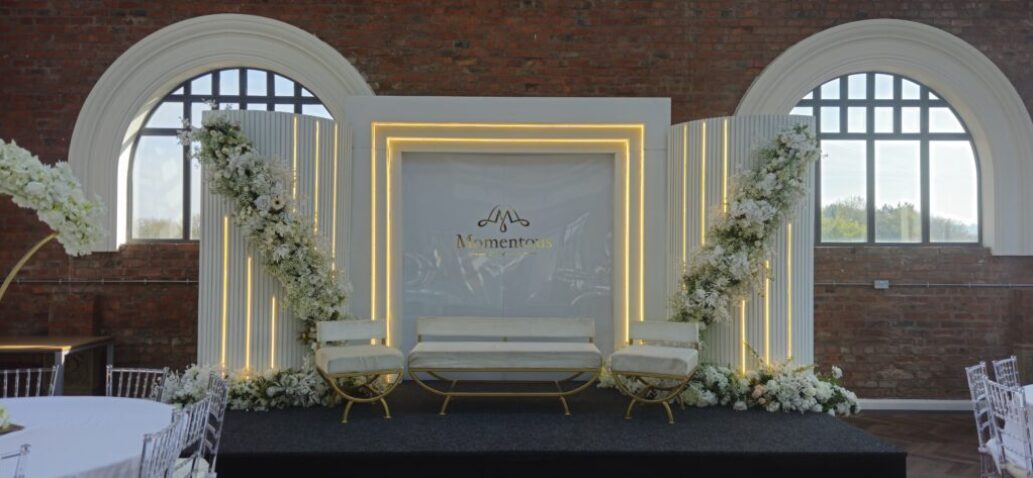 Luxurious catering setup at Heritage 1907, Ram Mill in Oldham, featuring vibrant drinks, desserts, and elegant floral decor for events