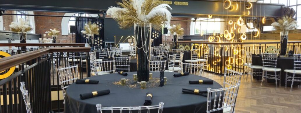 Exciting party at Heritage 1907, Ram Mill in Oldham, with dynamic lighting, industrial decor, and guests enjoying a lively celebration.